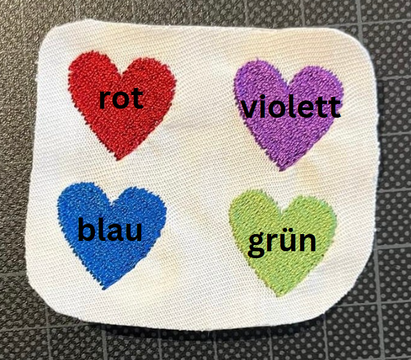 Schwarzes Basic T-Shirt mit gestickten Schriftzügen